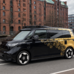 Autonomous Volkswagen ID. Buzz shuttle driving on a Hamburg street